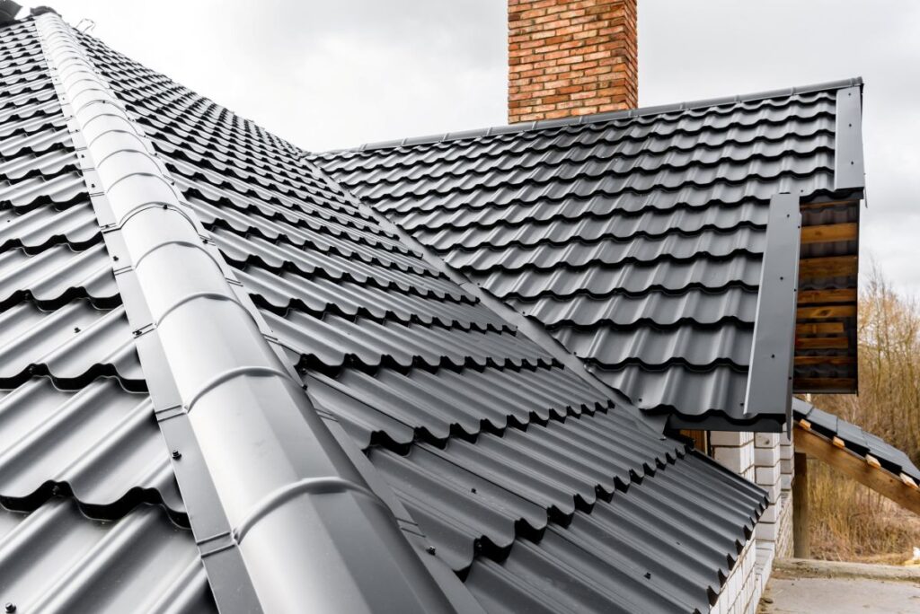 metal tile roof with a close-up of a roof ridge cap